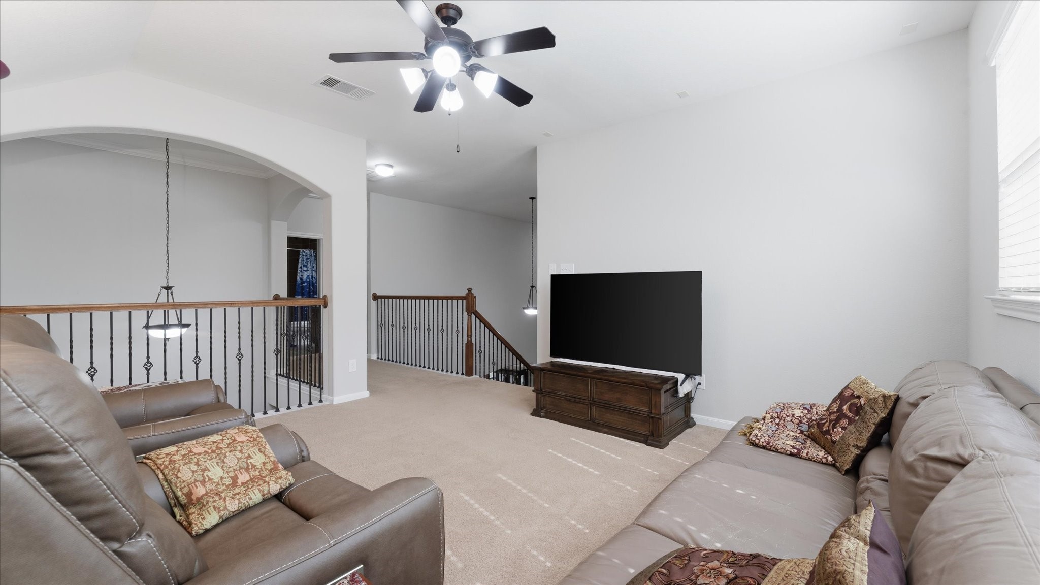 14 Painted Post Place Spring, TX 77389 - Photo 27 of 43 a bedroom with furniture and a flat screen tv