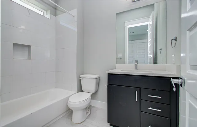 a view of wooden floor and brick walls