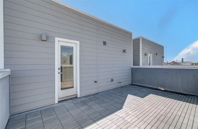 a view of balcony and kitchen