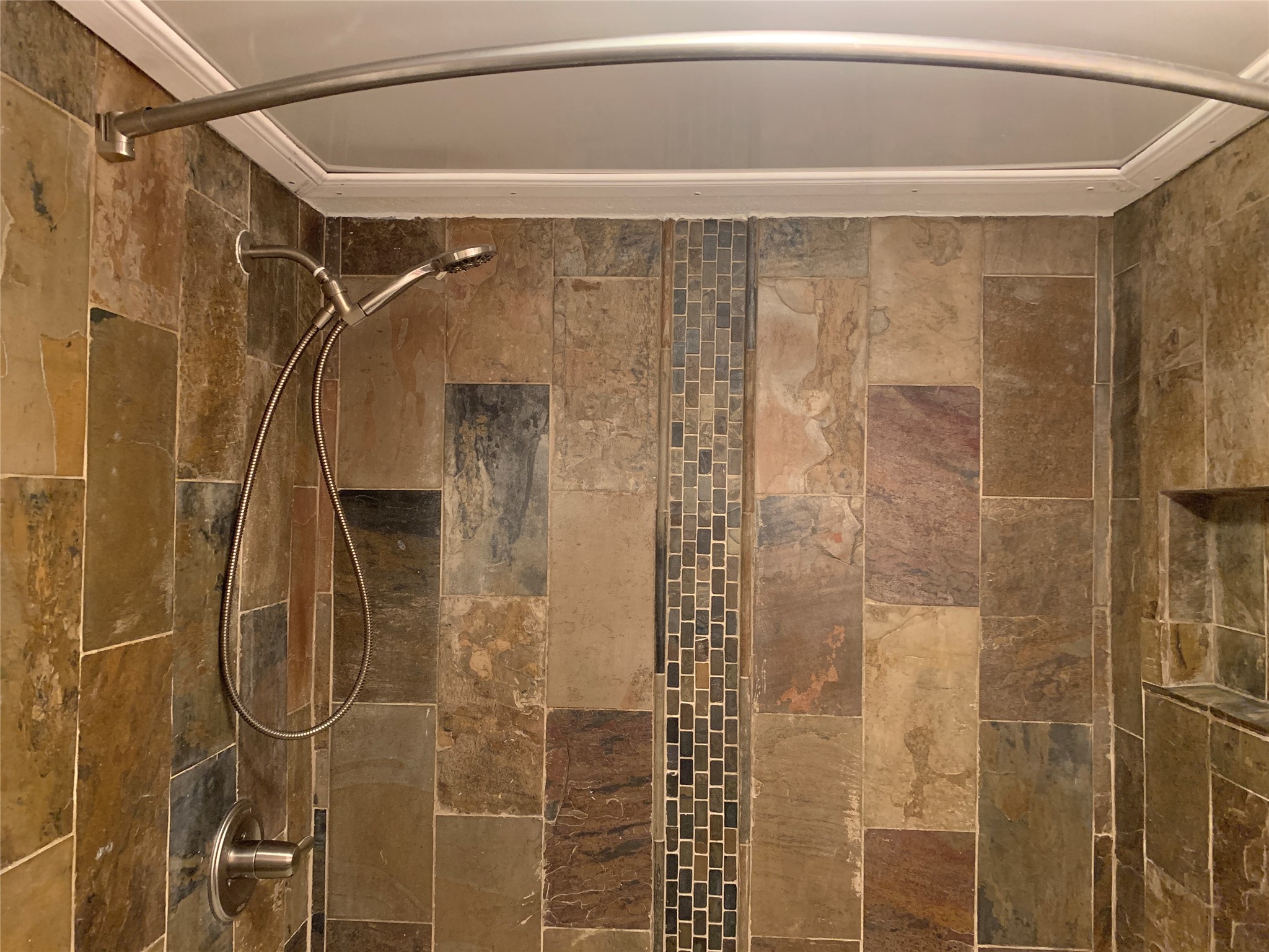 606 Marshall Street, Unit B13 Houston, TX 77006 - Photo 13 of 23 a bathroom with a shower