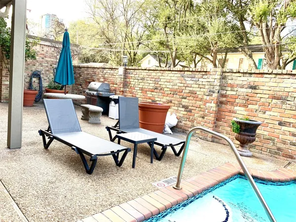 a view of a terrace with furniture