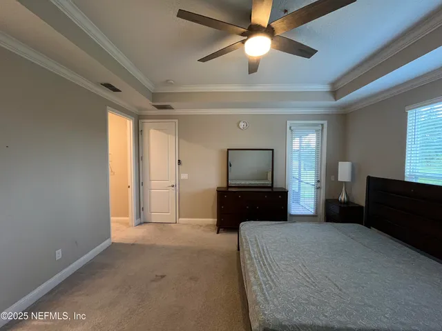 a bathroom with a glass door shower