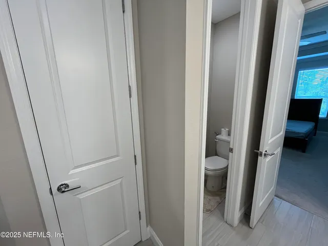 a bathroom with a toilet and a sink