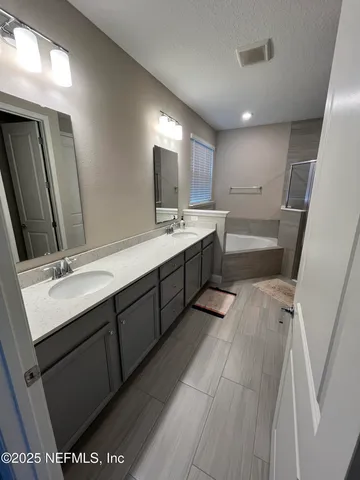 a view of outdoor space with seating area and trees around