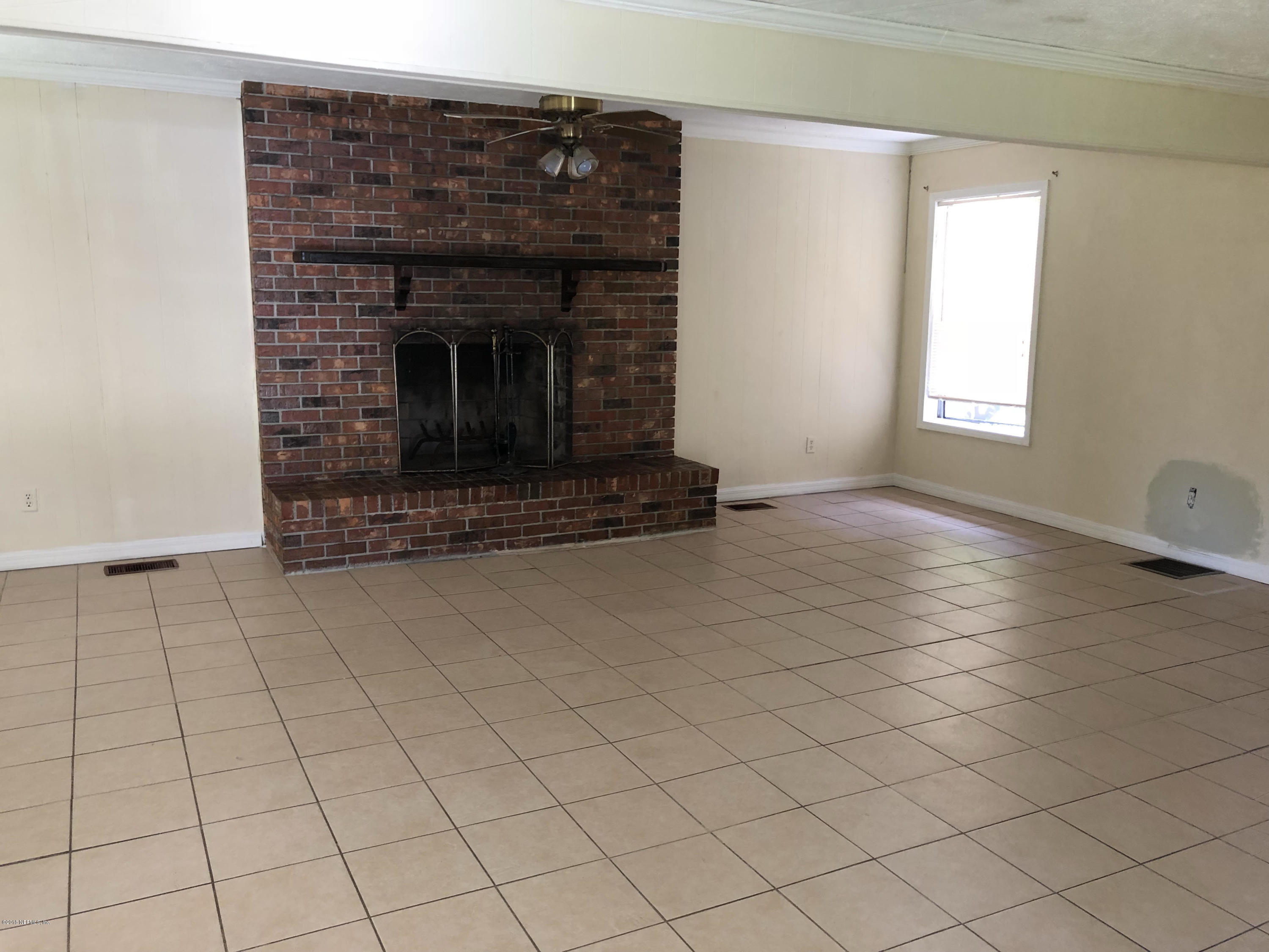 6636 Aline Road Jacksonville, FL 32244 - Photo 7 of 17 Arline Family room Fireplace