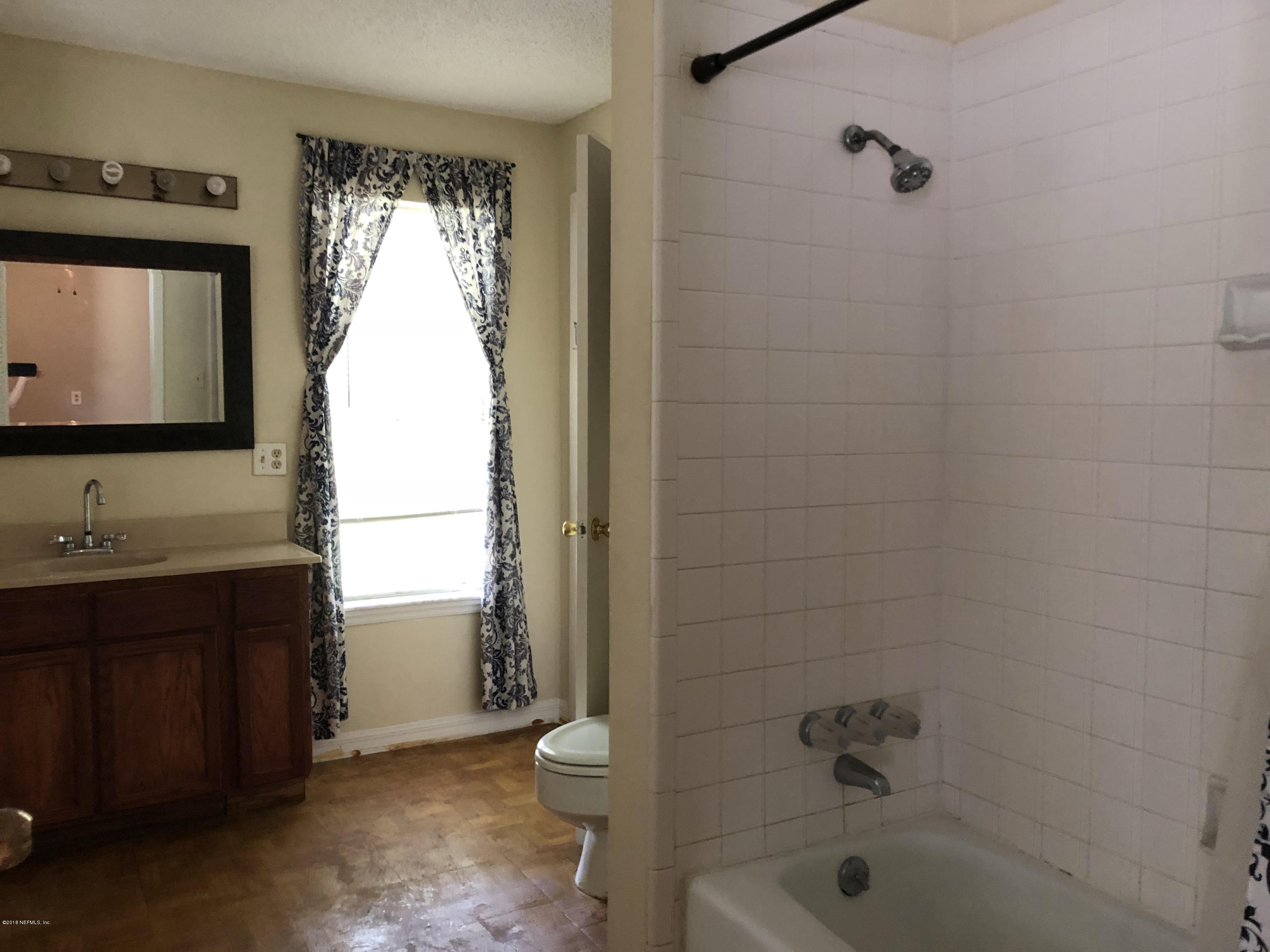 6636 Aline Road Jacksonville, FL 32244 - Photo 10 of 17 Arline bathroom 1