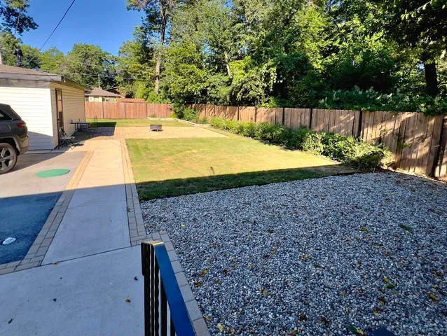 a view of a backyard with plants