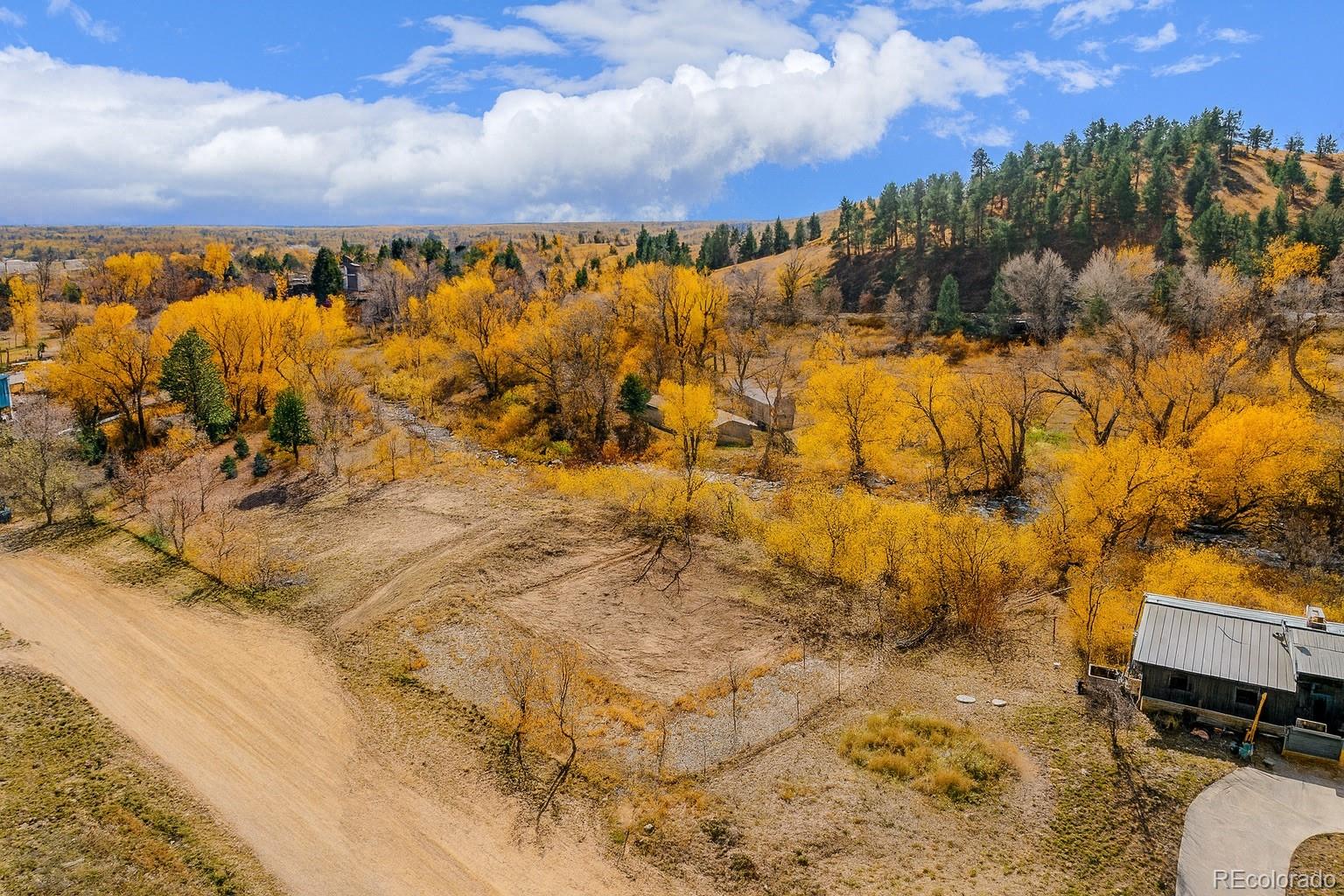 8775 Streamcrest Drive Boulder, CO 80302 - Photo 3 of 19 a view of a city
