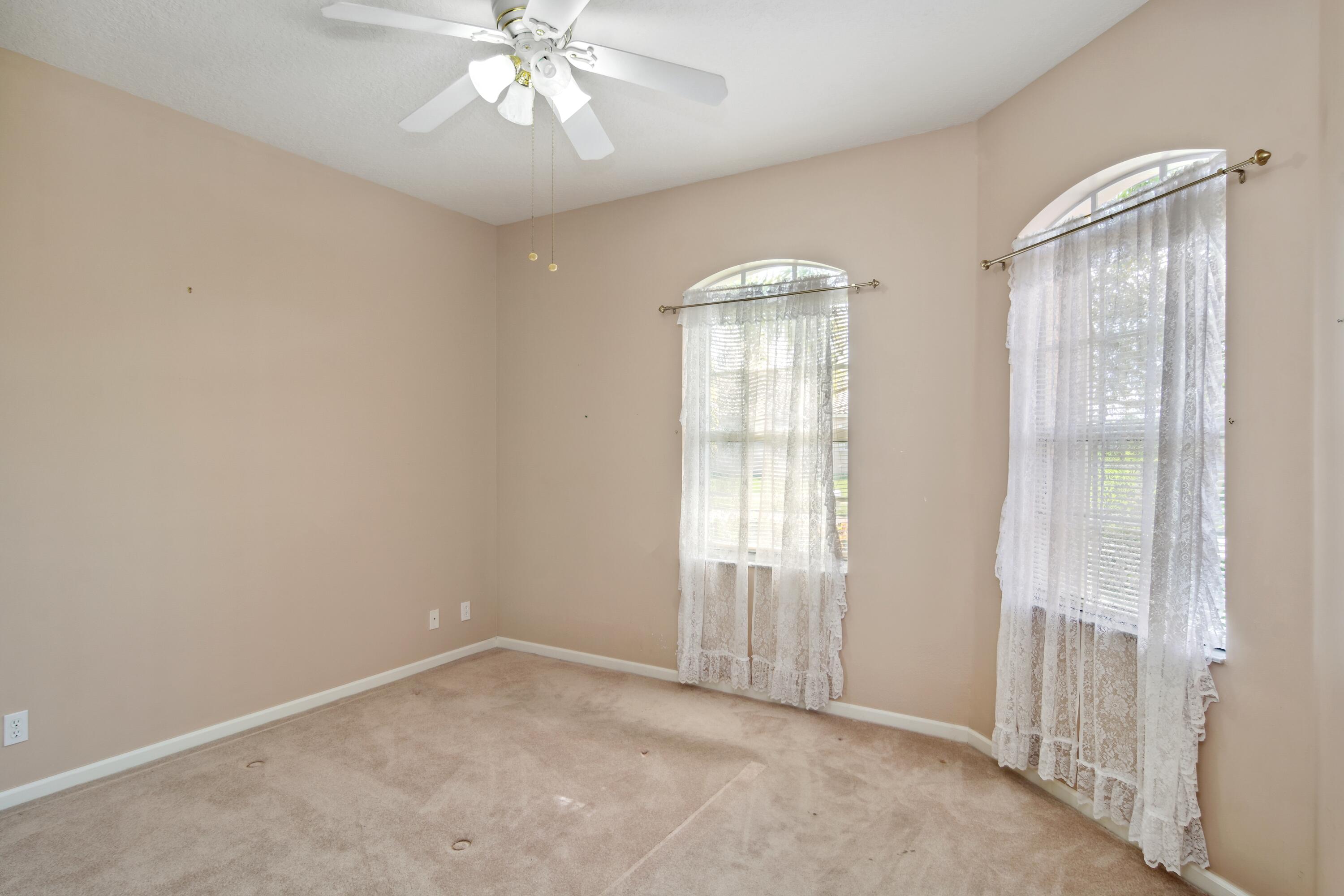 403 Springview Loop Port St. Lucie, FL 34986 - Photo 11 of 52 11_403NWSpringviewLoop_153_2ndBedroom_Hi