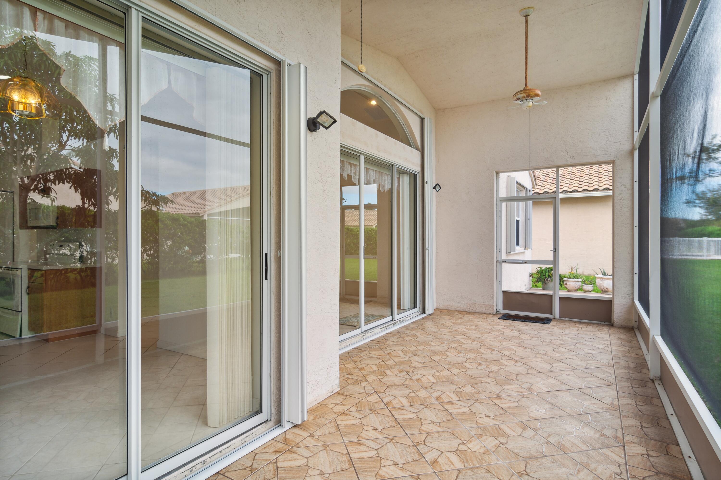 403 Springview Loop Port St. Lucie, FL 34986 - Photo 13 of 52 13_403NWSpringviewLoop_85001_Patio_HiRes