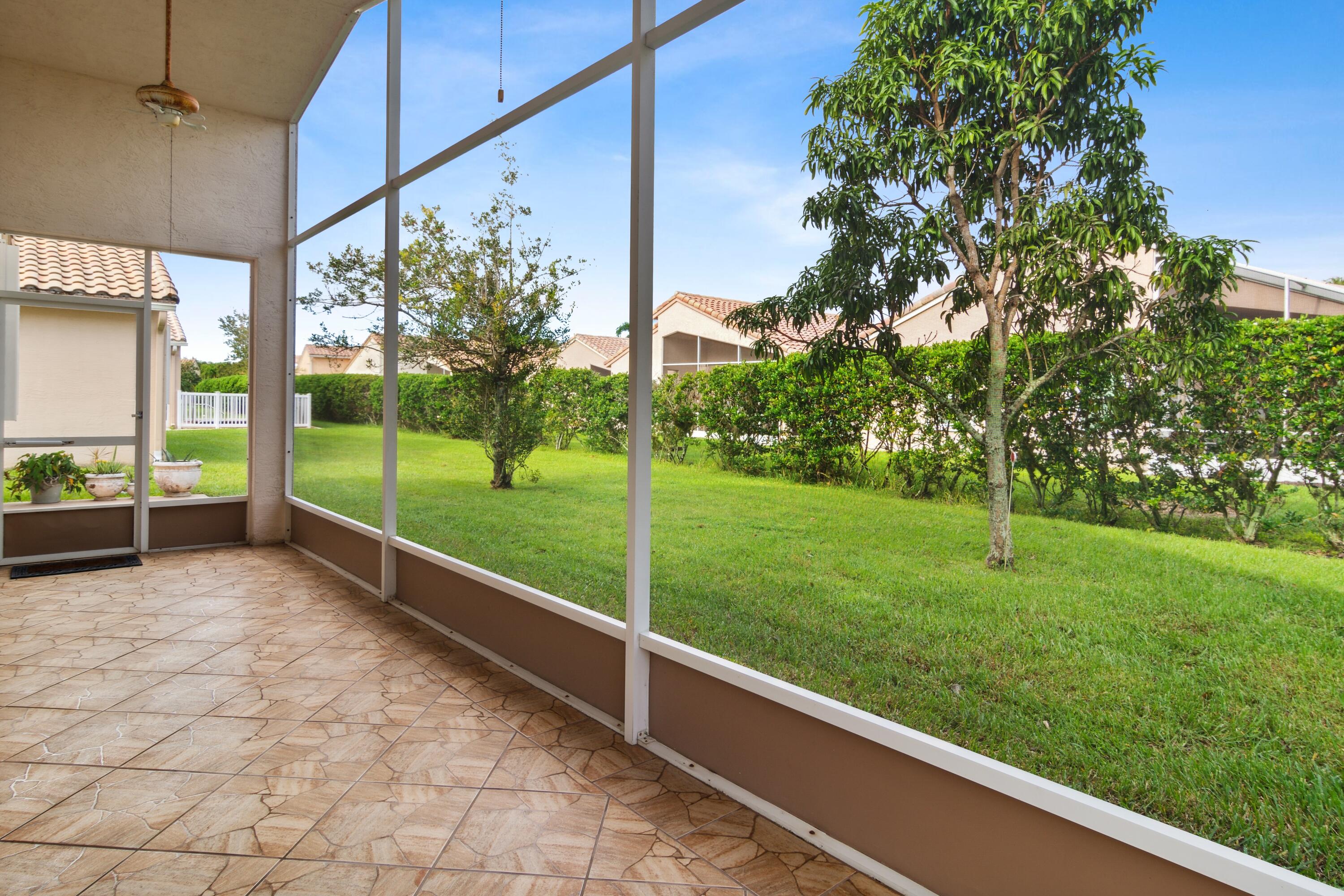 403 Springview Loop Port St. Lucie, FL 34986 - Photo 14 of 52 14_403NWSpringviewLoop_85002_Patio_HiRes