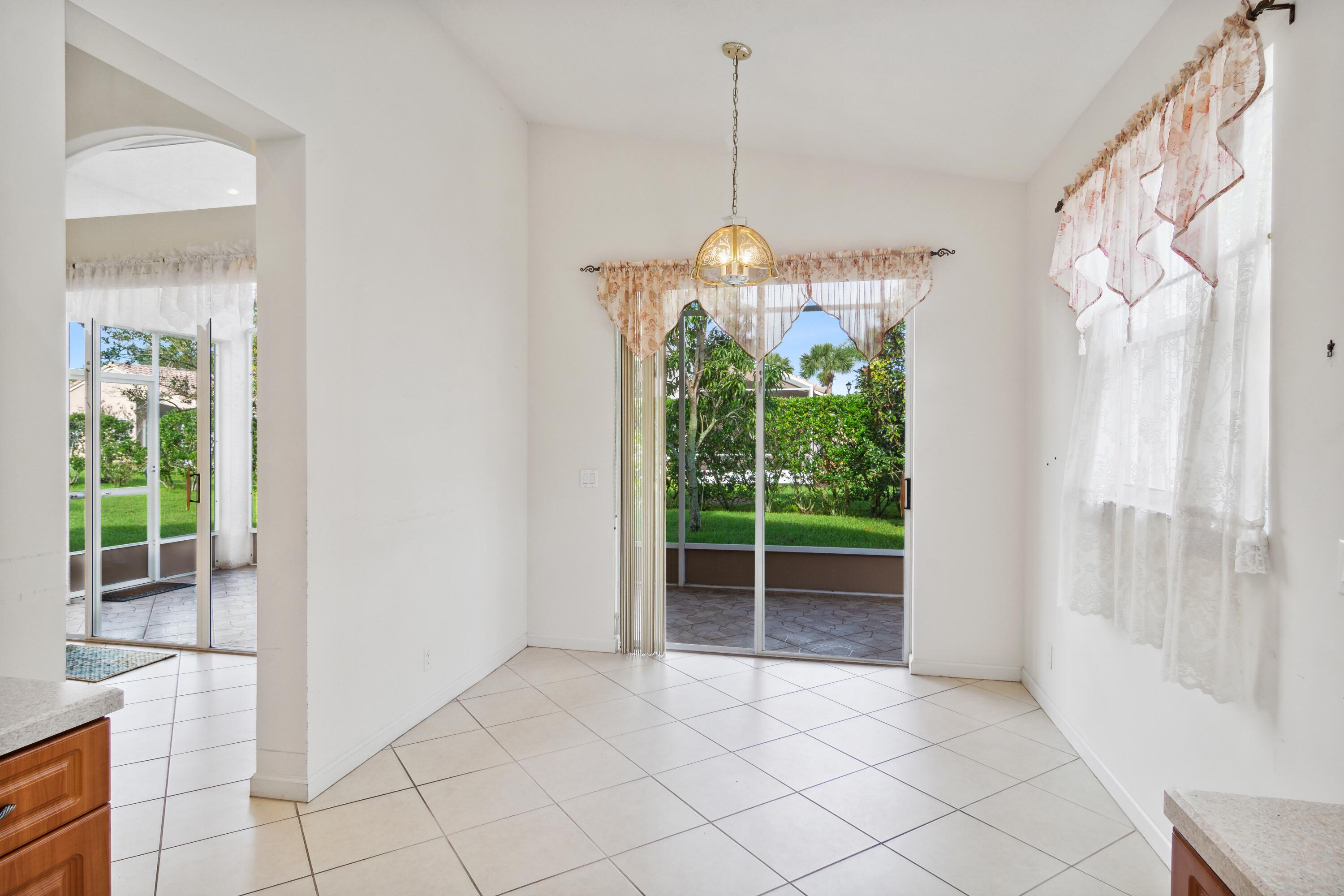 403 Springview Loop Port St. Lucie, FL 34986 - Photo 7 of 52 07_403NWSpringviewLoop_82_BreakfastNook_