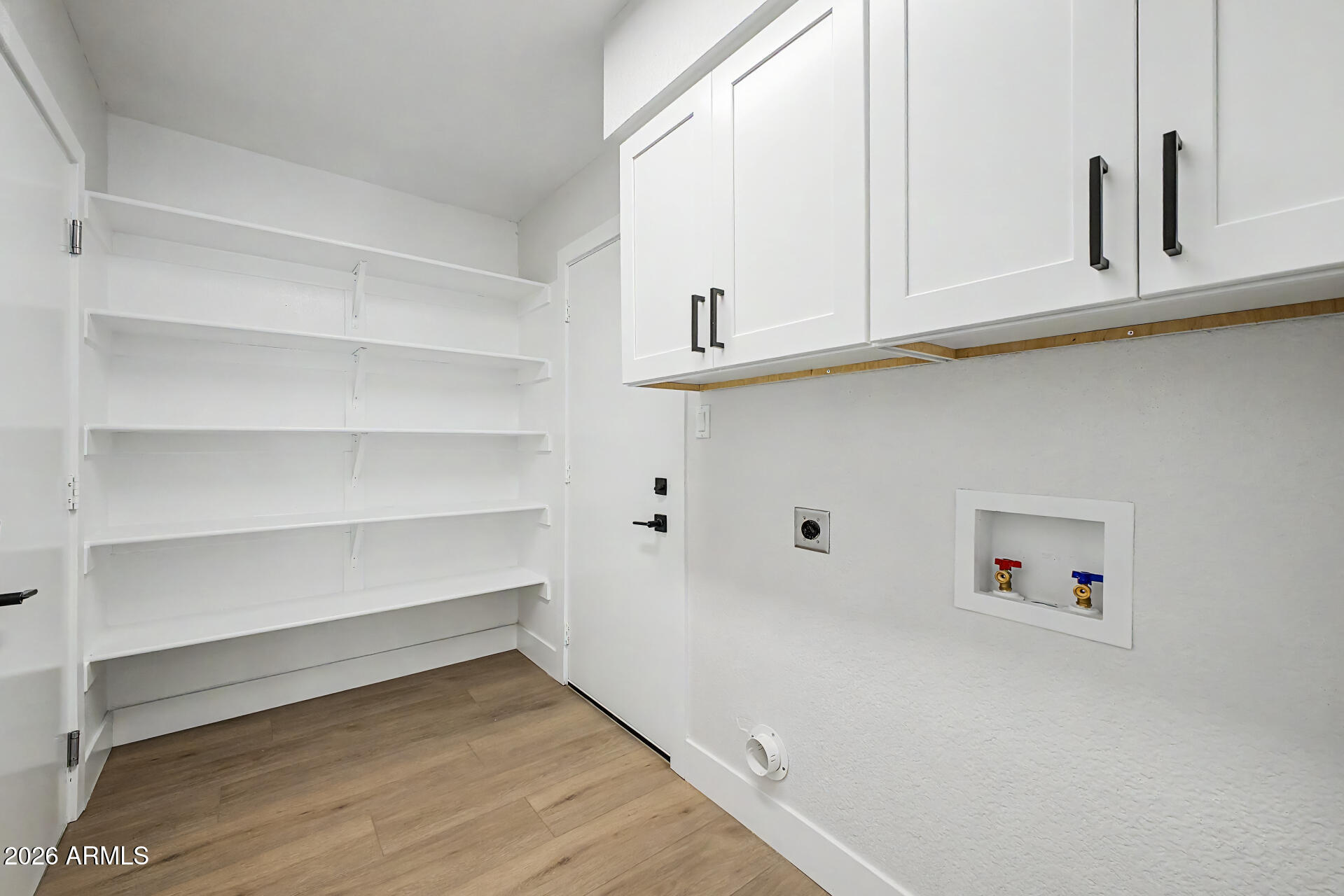 1009 West Pampa Avenue Mesa, AZ 85210 - Photo 27 of 31 a room with cabinets