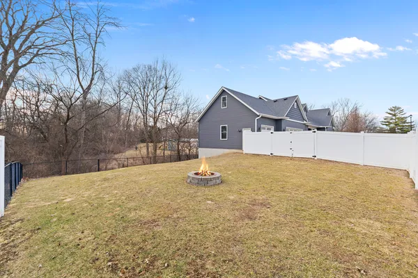 a view of a backyard of the house