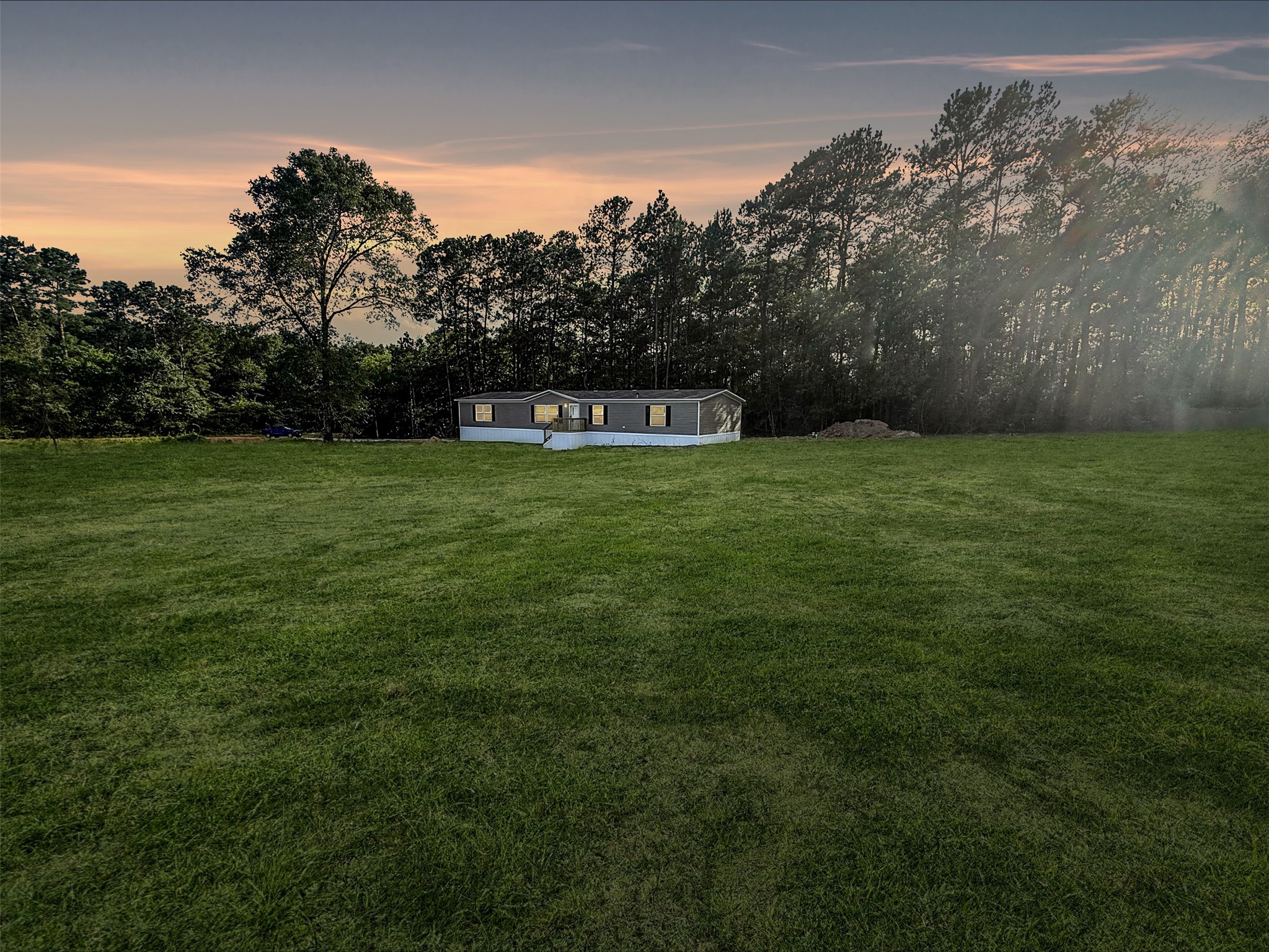 4846 Long Shadows Road Navasota, TX 77868 - Photo 1 of 12 5 bedroom home on 1 acre lot backs up to mature wooded lot. Grass is digitally enhanced