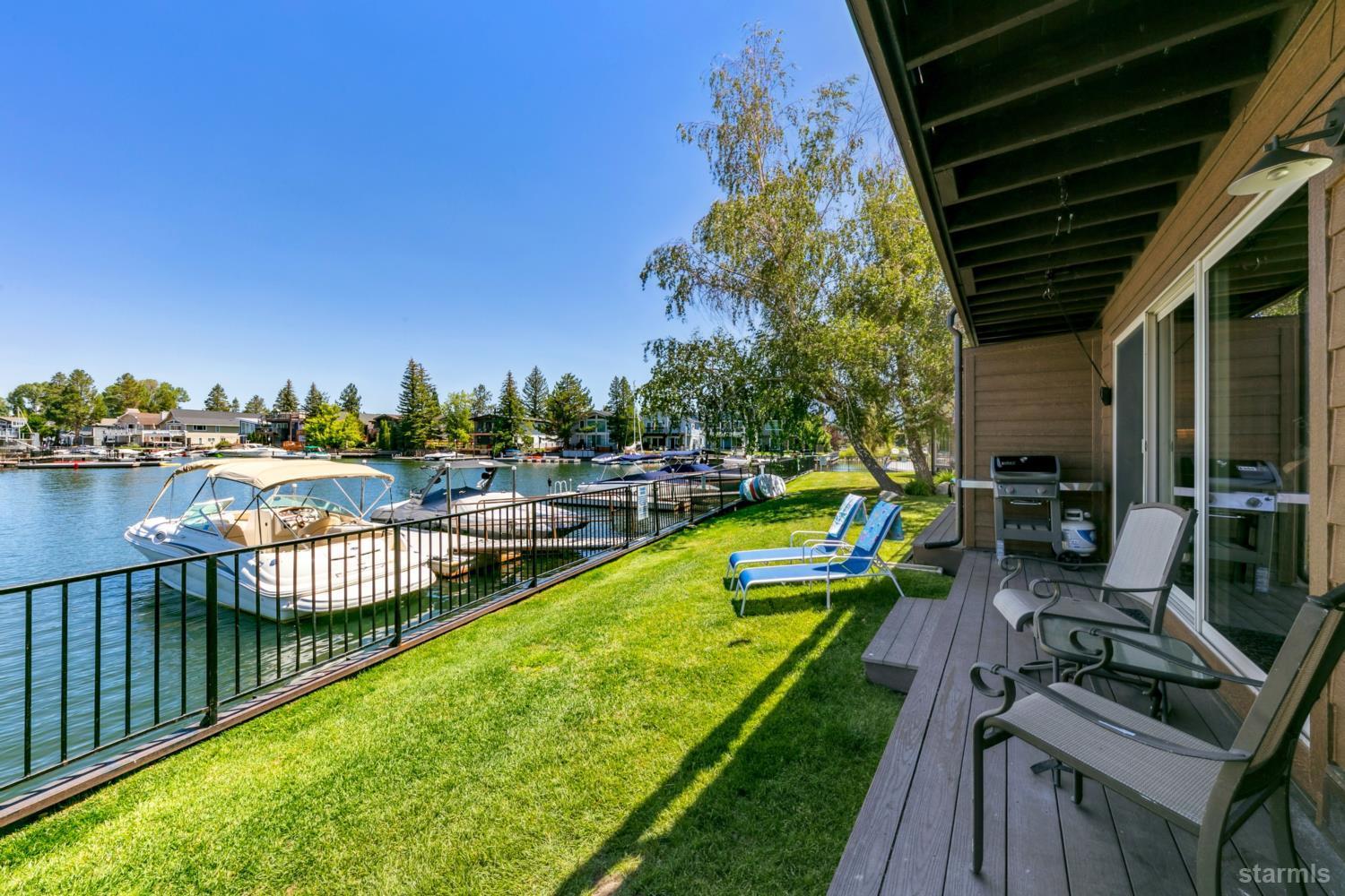 2031 Venice Drive, Unit 322 South Lake Tahoe, CA 96150 - Photo 18 of 38 a view of a swimming pool with a patio and a yard