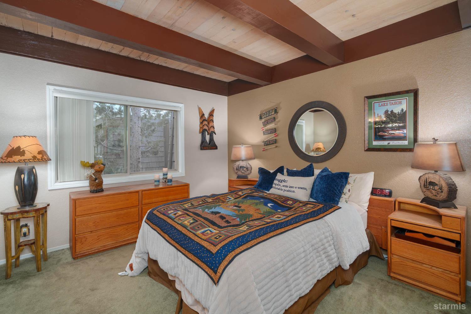 2031 Venice Drive, Unit 322 South Lake Tahoe, CA 96150 - Photo 31 of 38 a living room with furniture and a large window