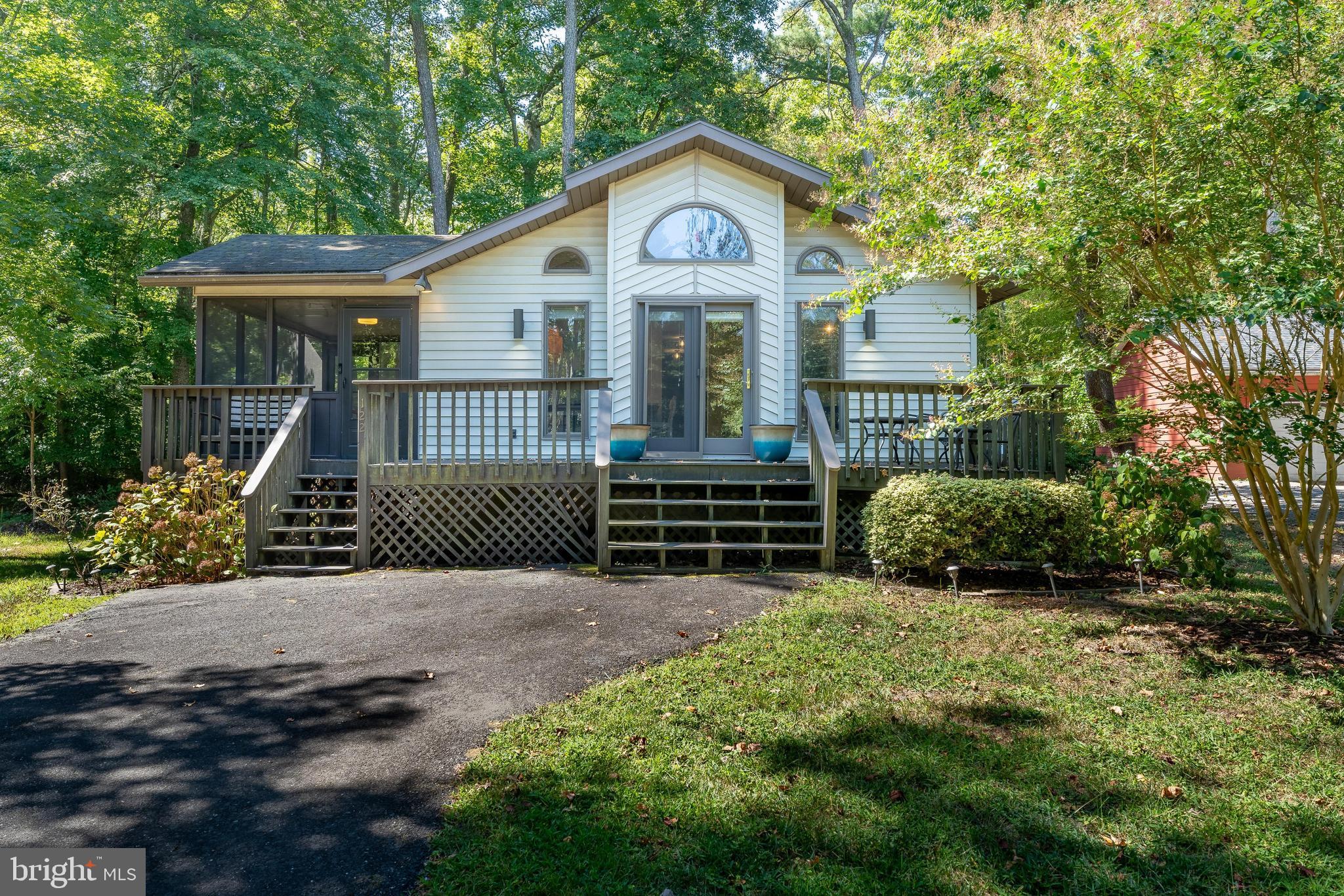 122 Nottingham Lane Ocean Pines, MD 21811 - Photo 1 of 45 a view of a house with a yard and plants