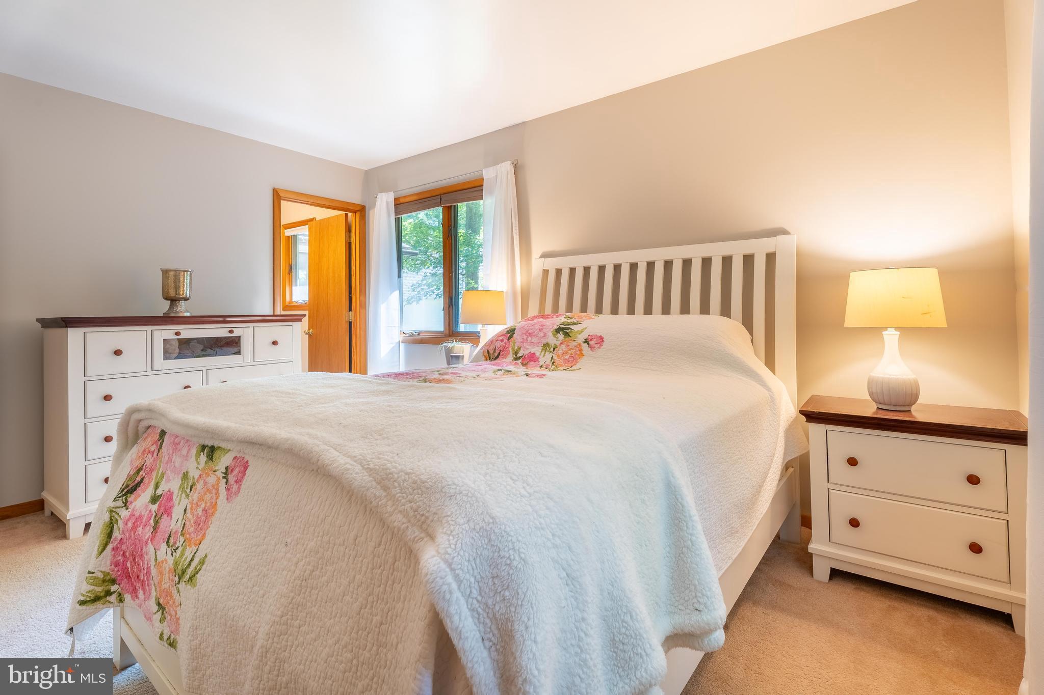 122 Nottingham Lane Ocean Pines, MD 21811 - Photo 15 of 45 a bedroom with a bed and a dresser