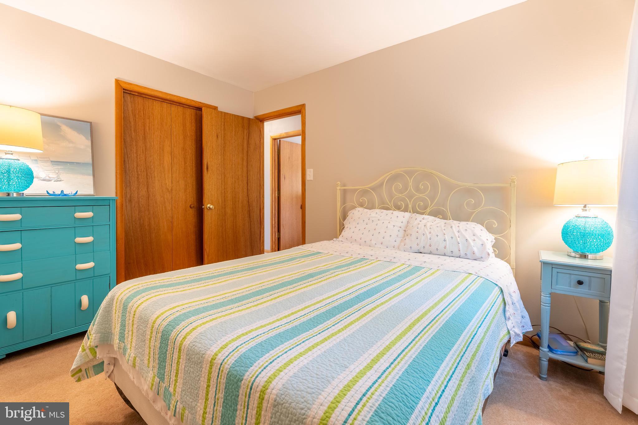 122 Nottingham Lane Ocean Pines, MD 21811 - Photo 21 of 45 a bedroom with a bed and a window