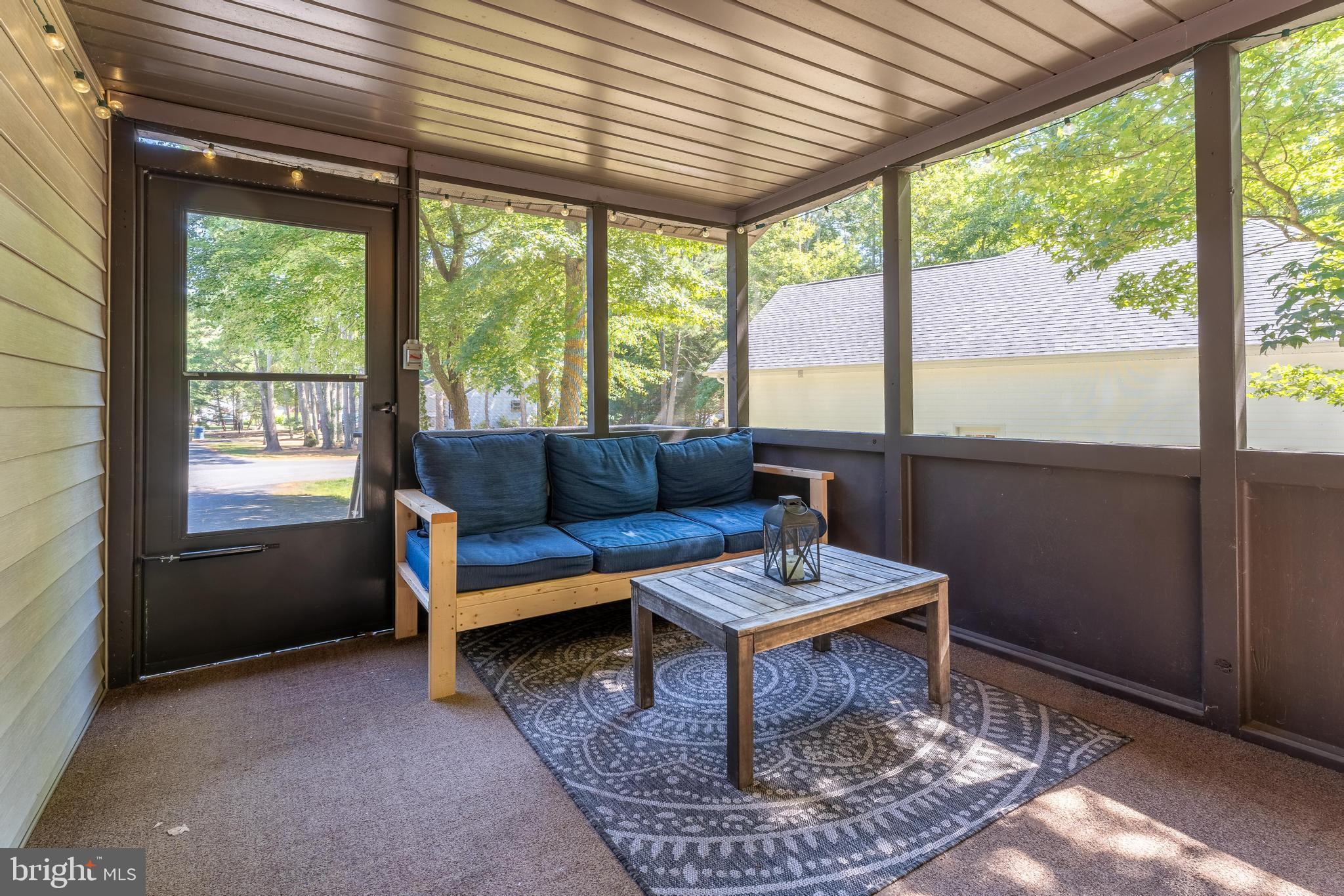 122 Nottingham Lane Ocean Pines, MD 21811 - Photo 29 of 45 a living room with furniture and a window