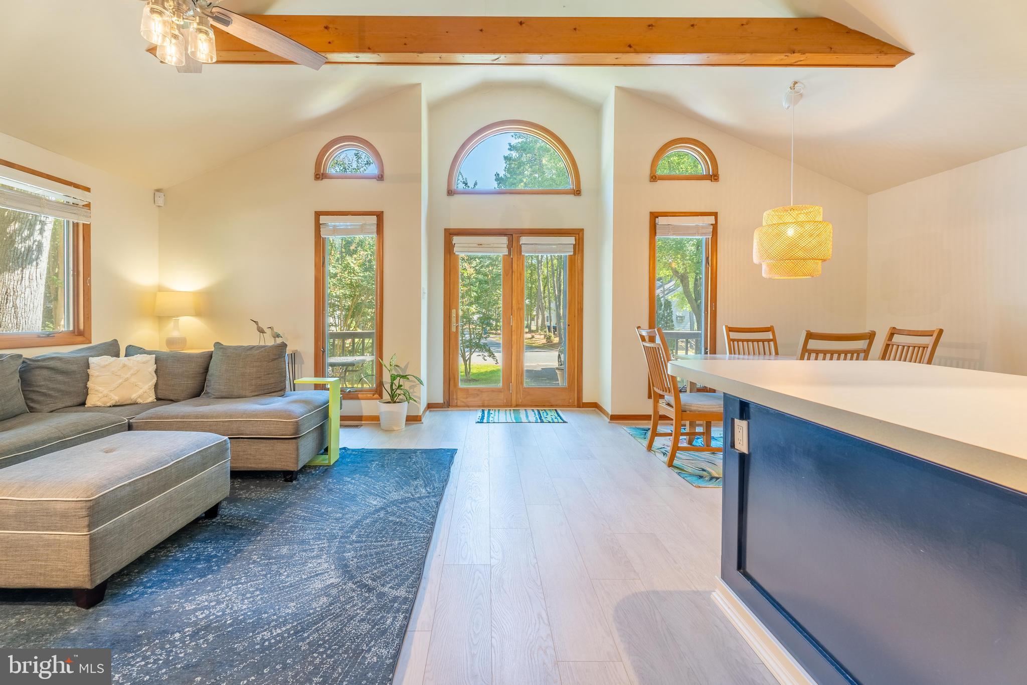 122 Nottingham Lane Ocean Pines, MD 21811 - Photo 4 of 45 a living room with furniture and a large window