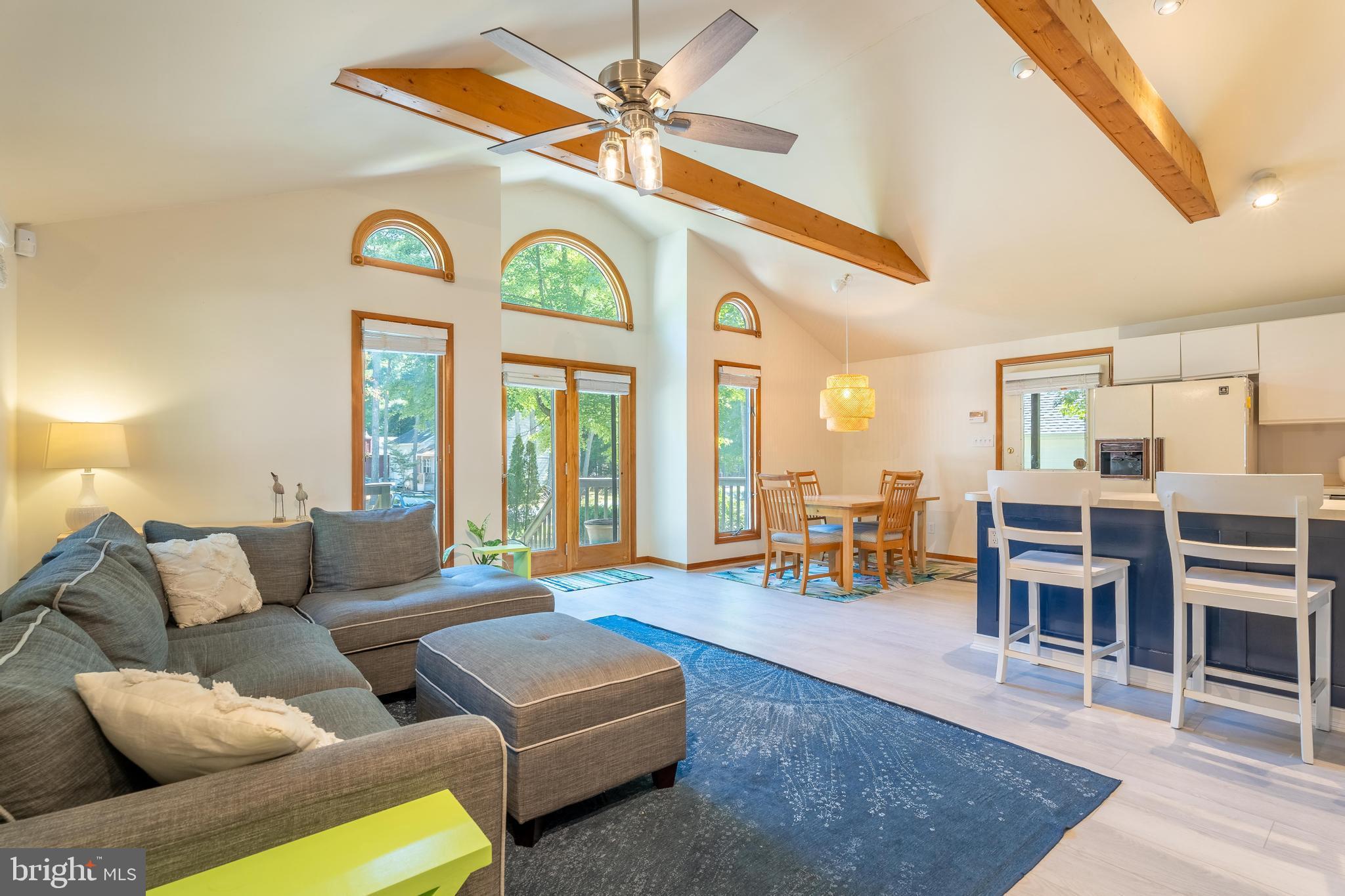 122 Nottingham Lane Ocean Pines, MD 21811 - Photo 9 of 45 a living room with furniture and a large window