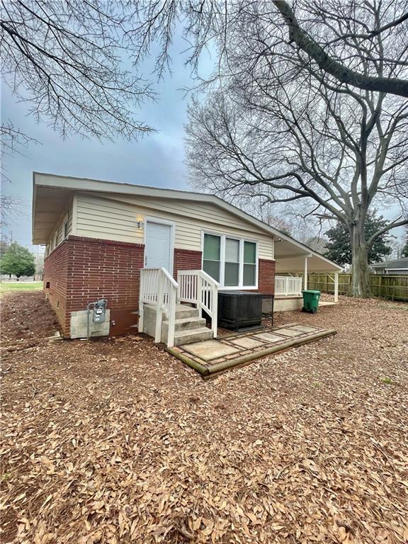1367 West Austin Road Decatur, GA 30032 - Photo 1 of 1 a front view of a house with garden