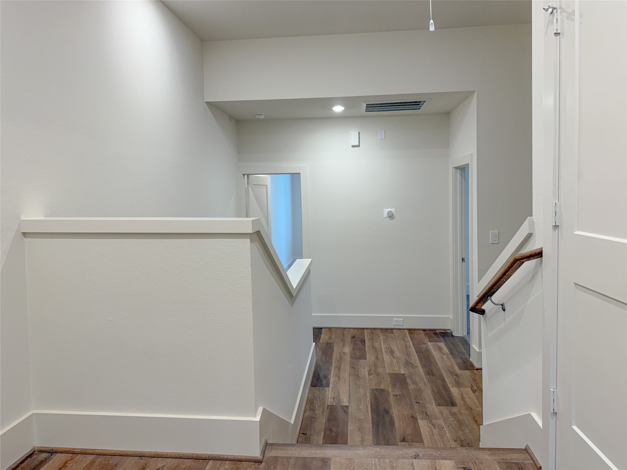 879 Rachel Street, Unit D Houston, TX 77091 - Photo 19 of 29 a view of entryway with wooden floor