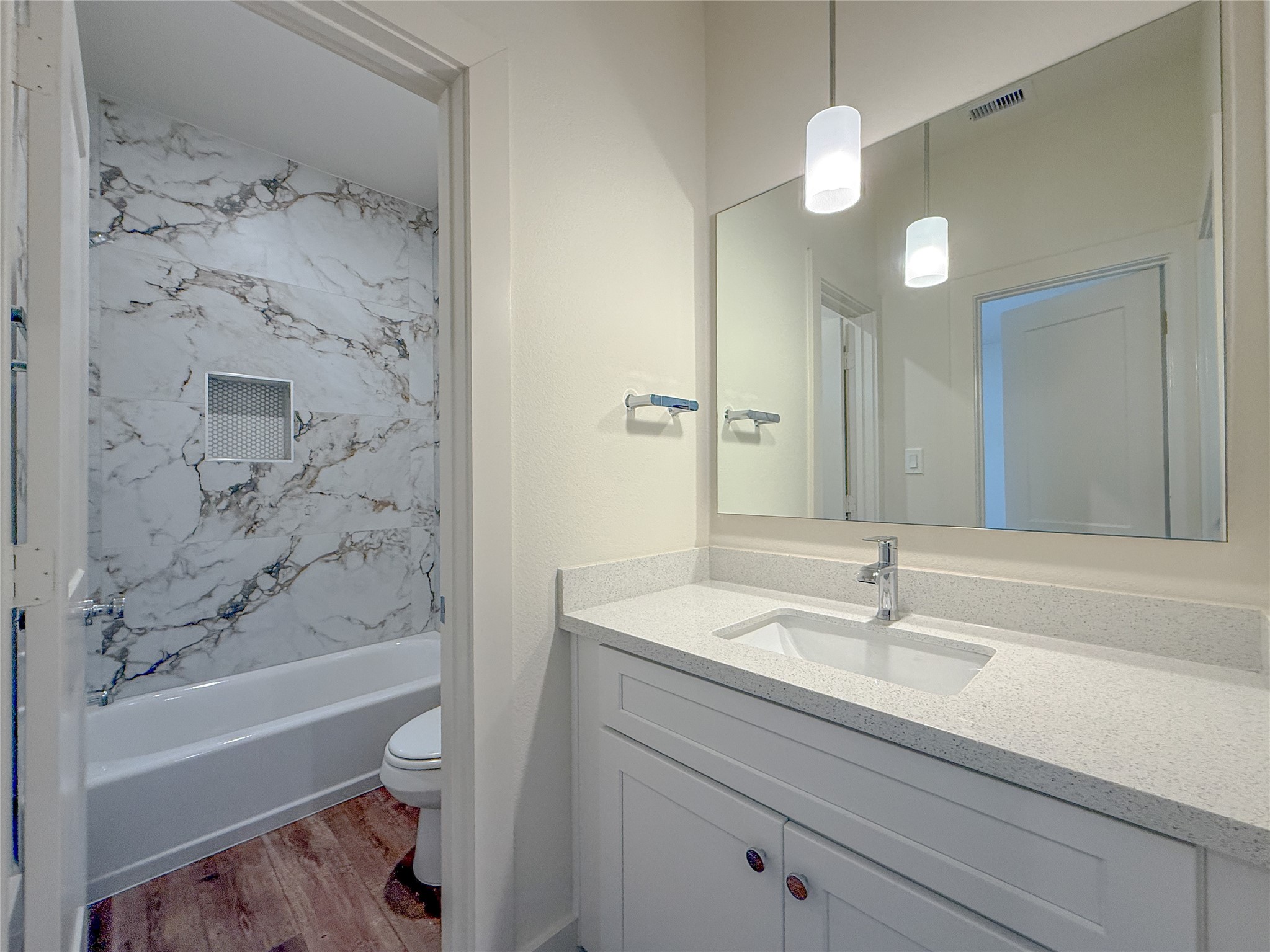 879 Rachel Street, Unit D Houston, TX 77091 - Photo 22 of 29 a bathroom with a sink a toilet and shower