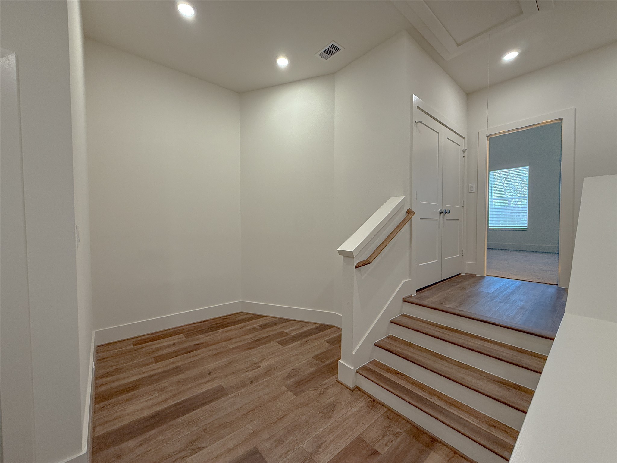 879 Rachel Street, Unit D Houston, TX 77091 - Photo 24 of 29 a view of entryway with wooden floor