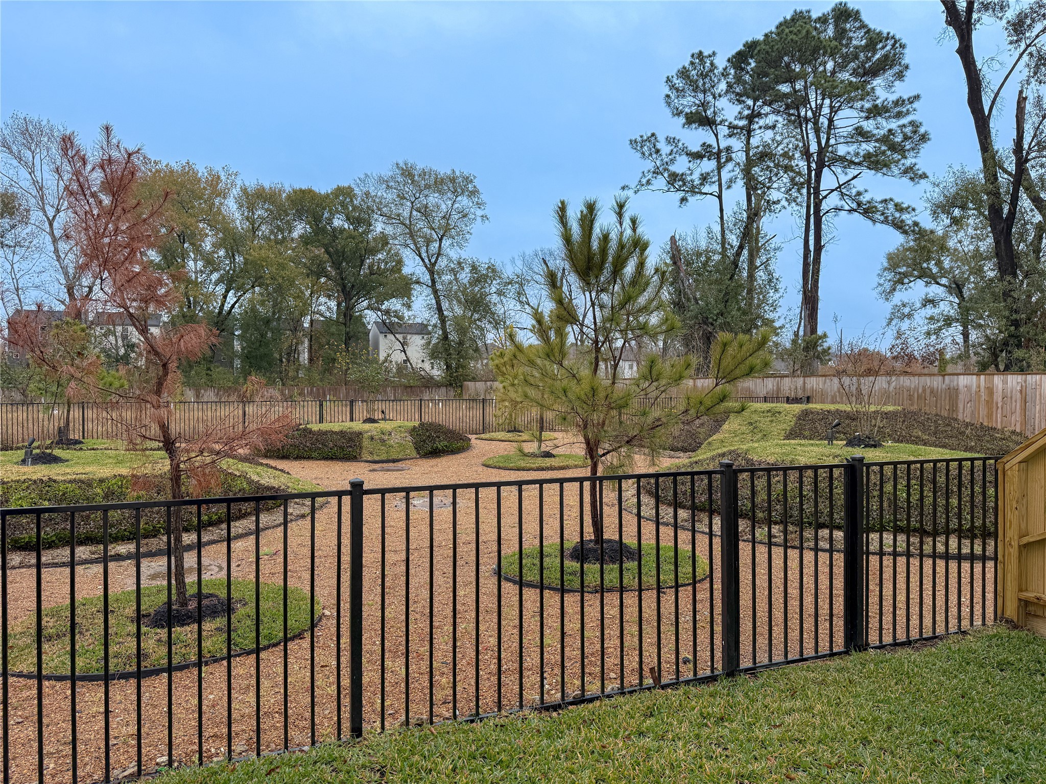 879 Rachel Street, Unit D Houston, TX 77091 - Photo 26 of 29 a view of a wrought iron gate