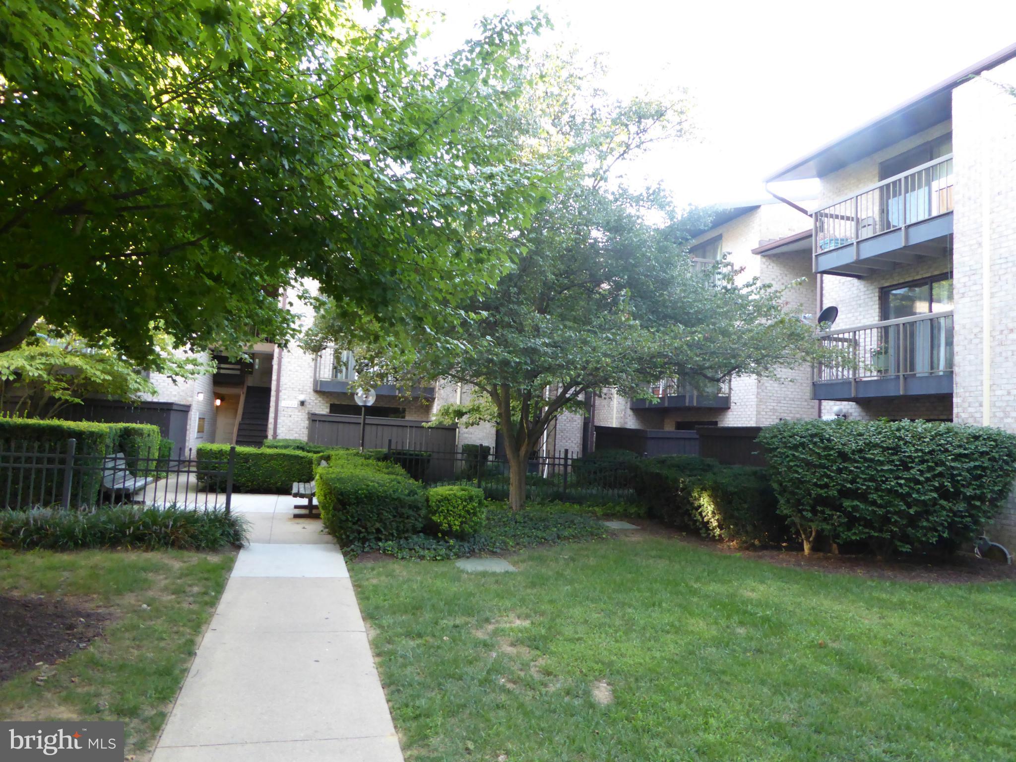 10024 Stedwick Road, Unit 202 Gaithersburg, MD 20886 - Photo 2 of 21 View on approach to the building