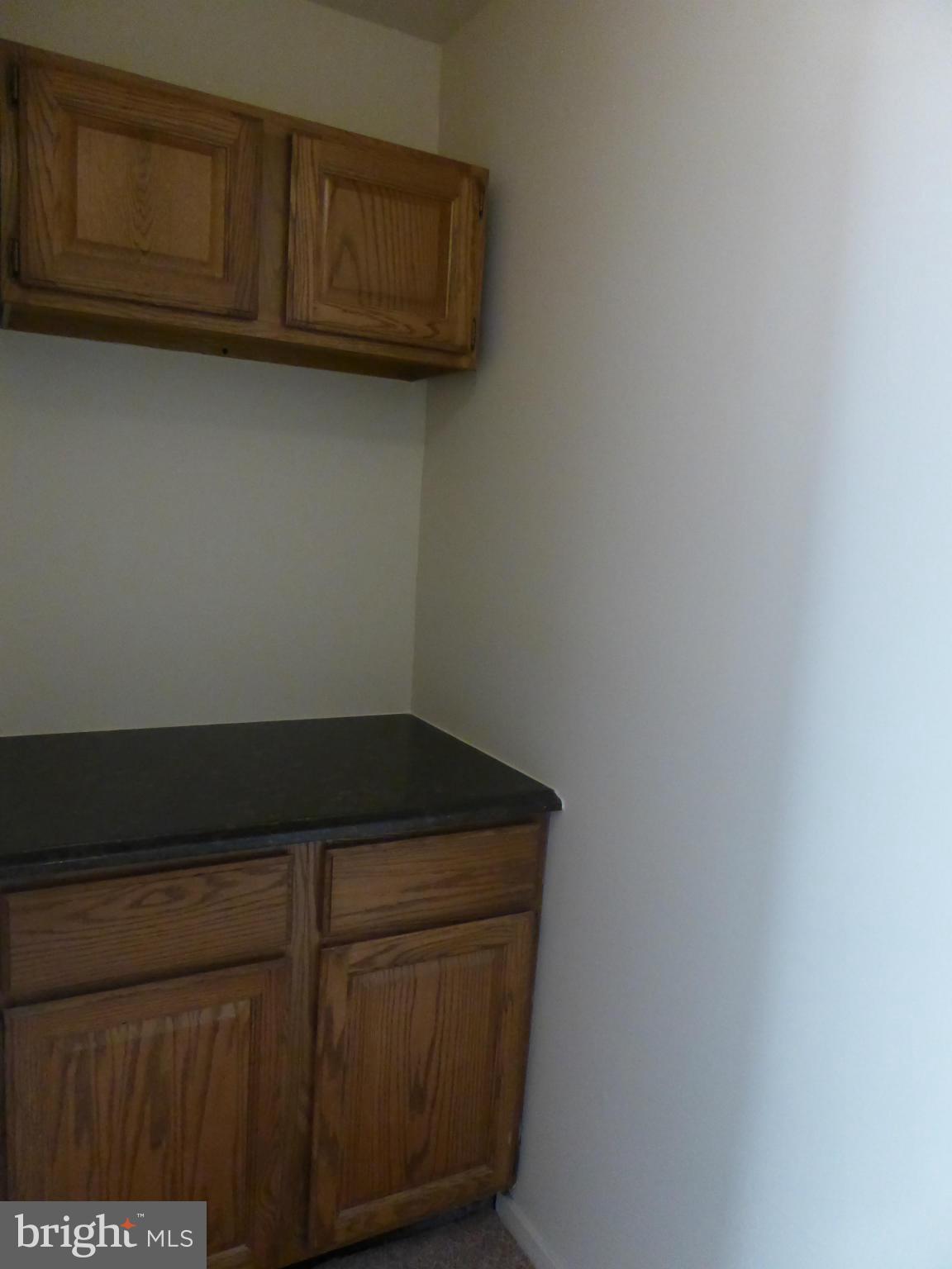 10024 Stedwick Road, Unit 202 Gaithersburg, MD 20886 - Photo 12 of 21 Closet with built in cabinet that could be study d