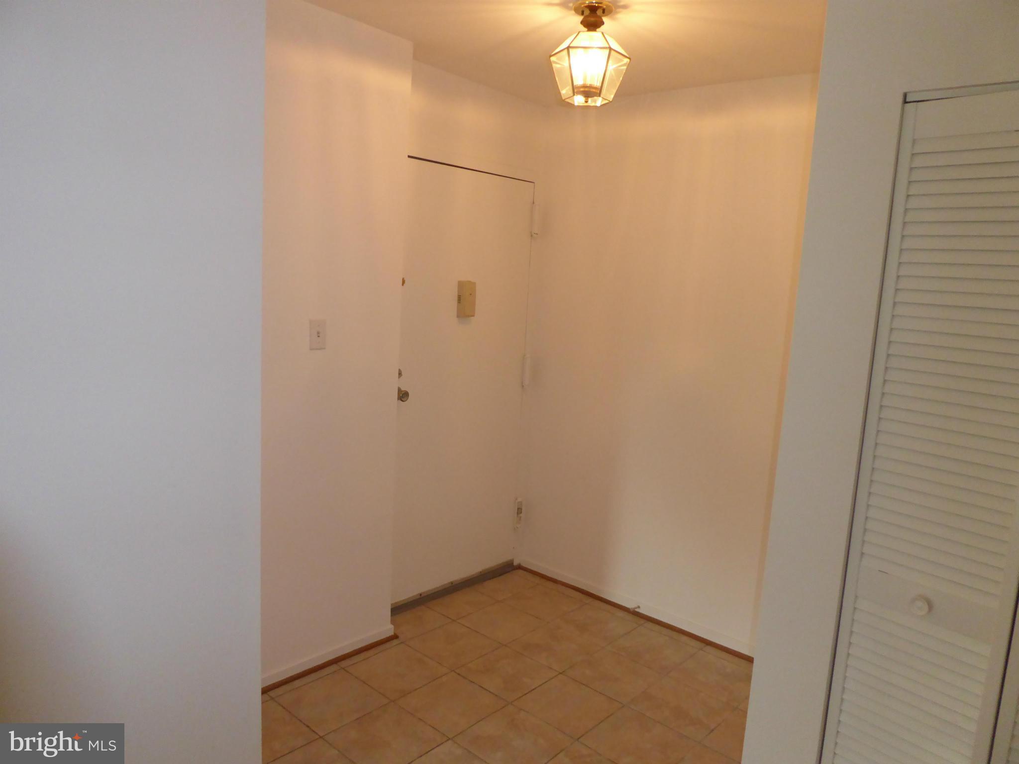 10024 Stedwick Road, Unit 202 Gaithersburg, MD 20886 - Photo 3 of 21 Foyer
