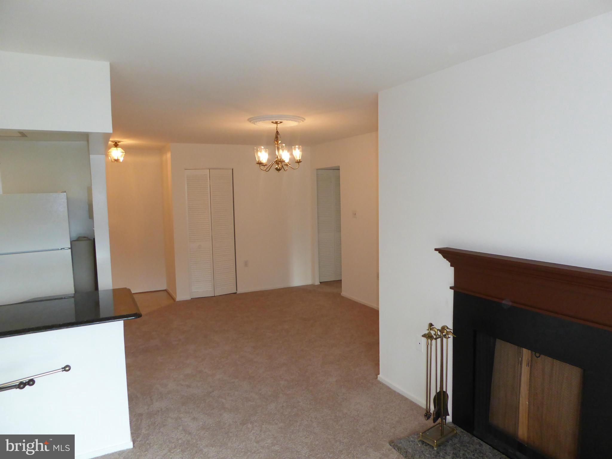 10024 Stedwick Road, Unit 202 Gaithersburg, MD 20886 - Photo 8 of 21 looking toward dining room from living room