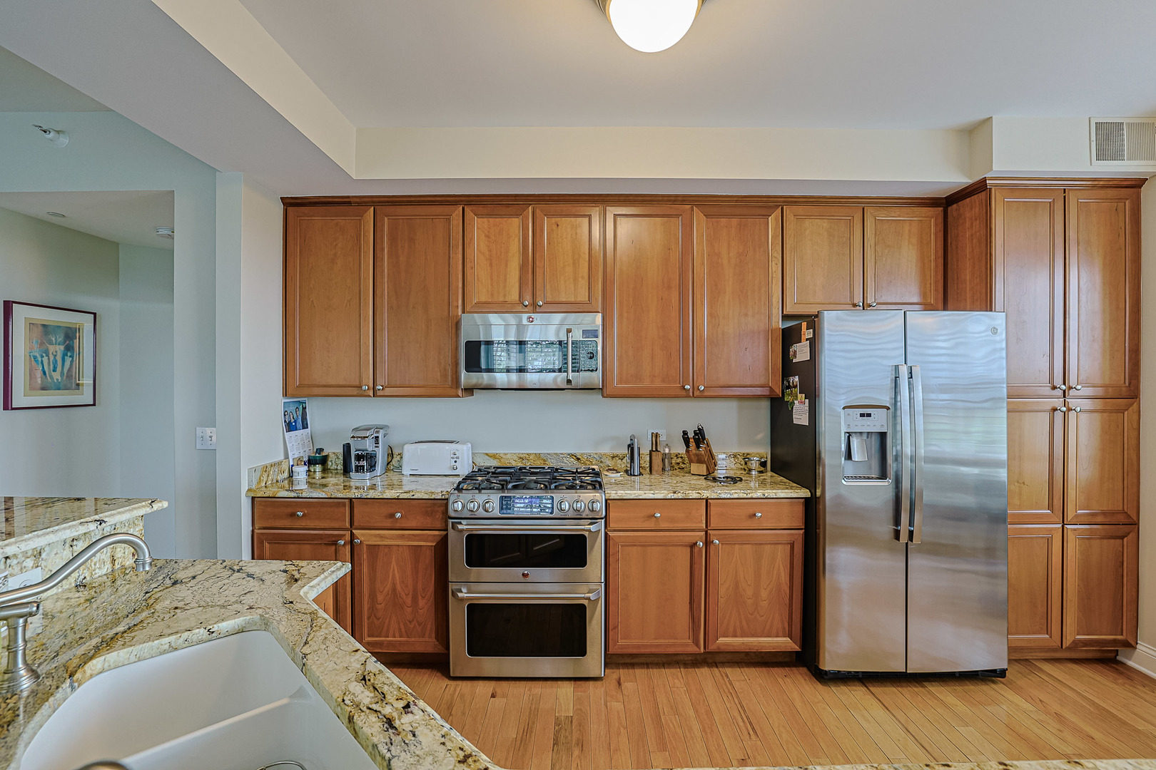 2700 Summit Drive, Unit 401 Glenview, IL 60025 - Photo 15 of 31 a kitchen with a sink stove and refrigerator