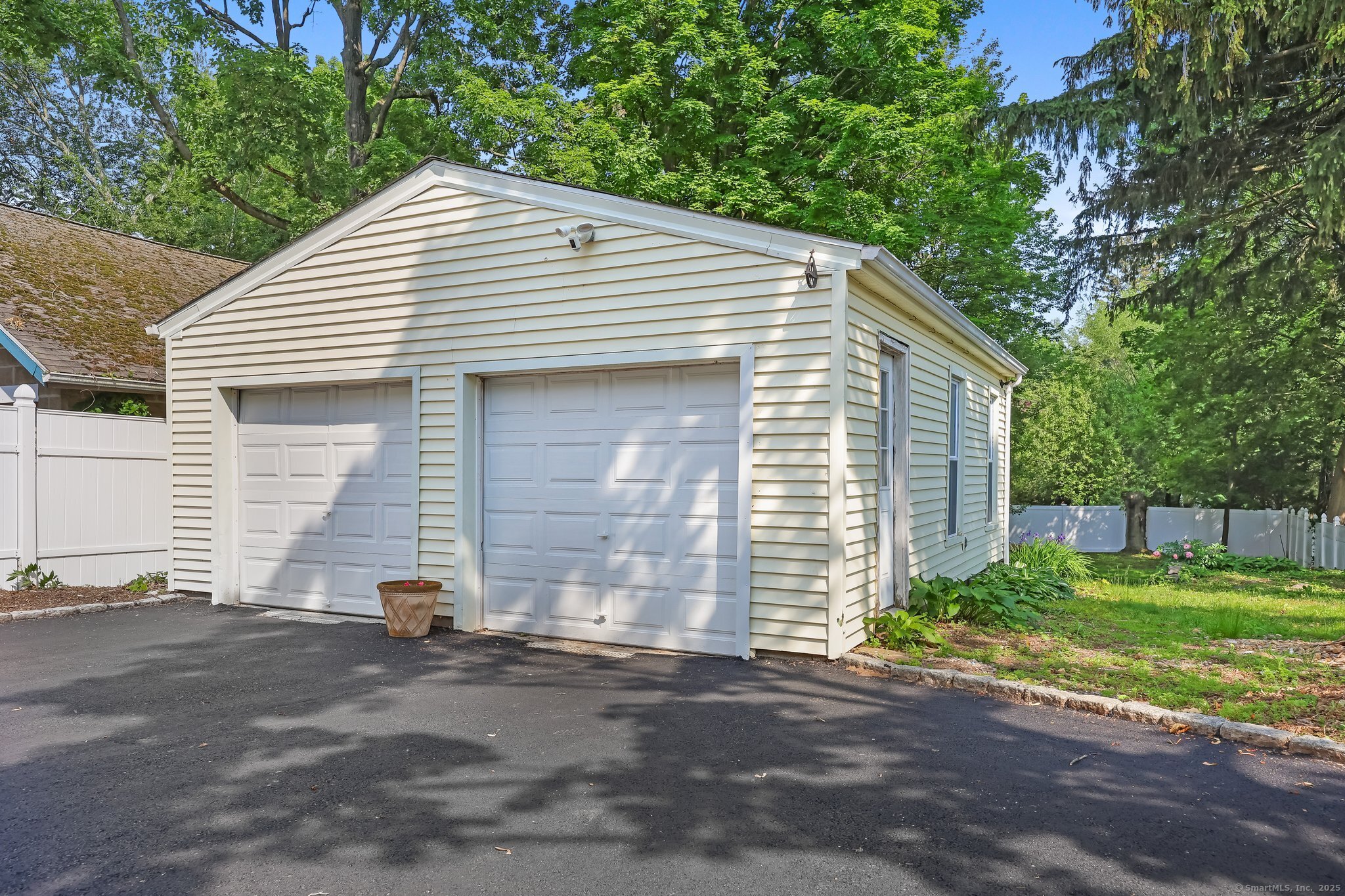 366 Suburban Avenue Fairfield, CT 06825 - Photo 28 of 34 a view of a house with a yard
