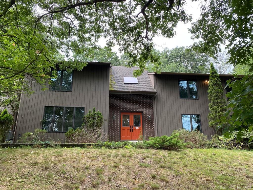 245 Porters Hill Road Monroe, CT 06468 - Photo 1 of 1 a front view of a house with garden