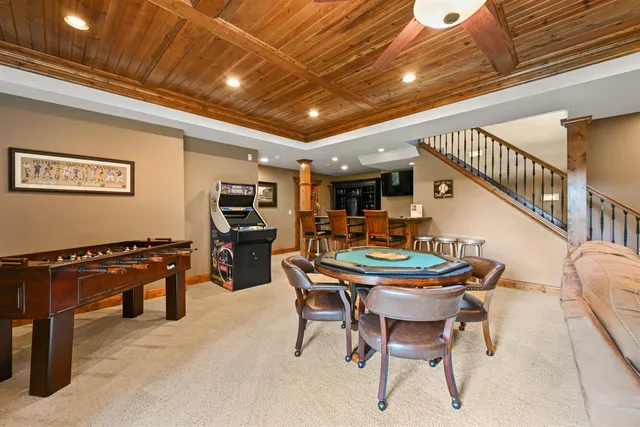 a dining room with furniture and window