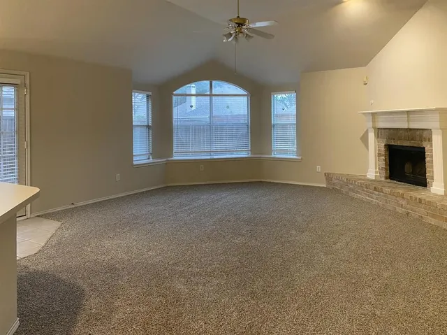 en empty room with windows