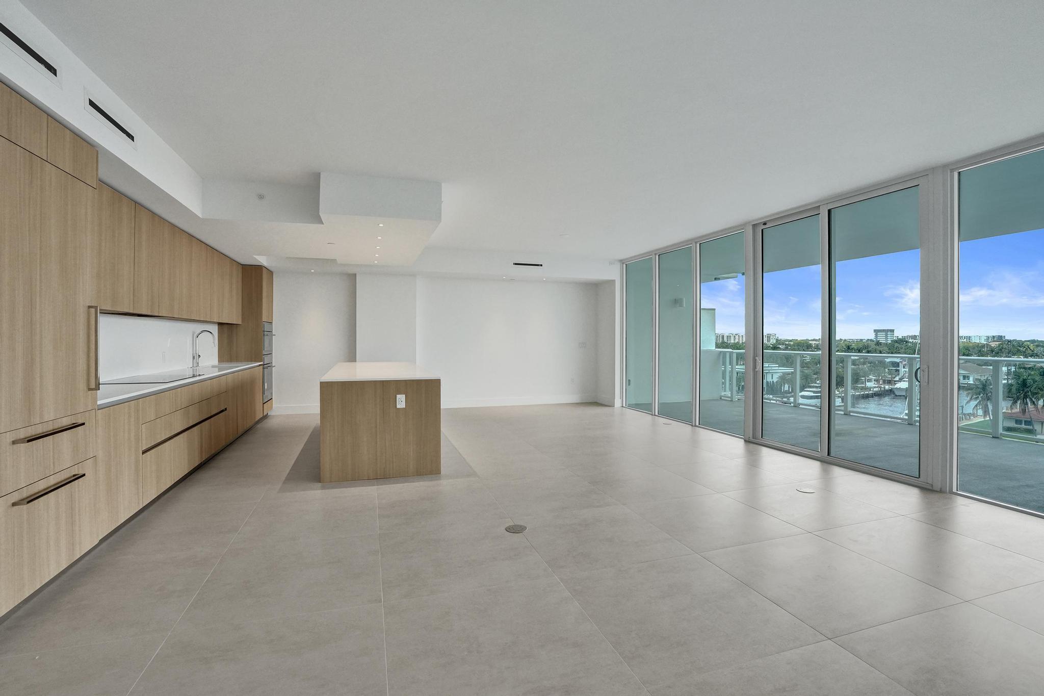 407 North Riverside Drive, Unit 602 Pompano Beach, FL 33062 - Photo 9 of 83 a view of an empty room with a window