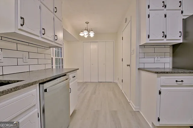 a view of room with hardwood floor