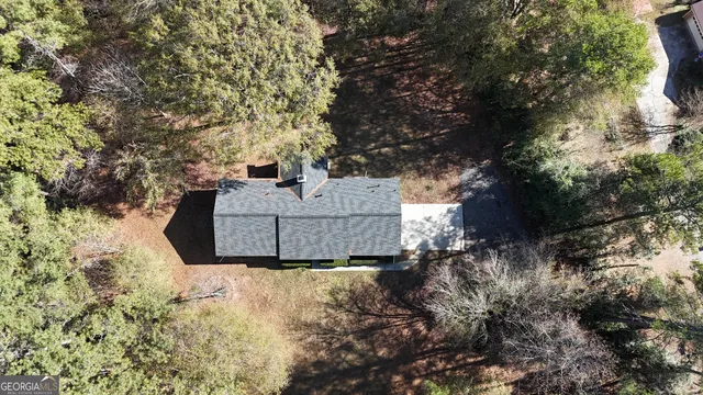 a terrace of a house with outdoor seating