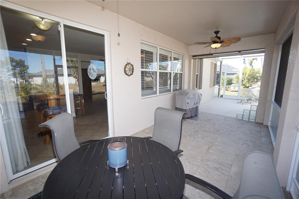25554 Prada Drive Punta Gorda, FL 33955 - Photo 28 of 56 a dining room with furniture and window