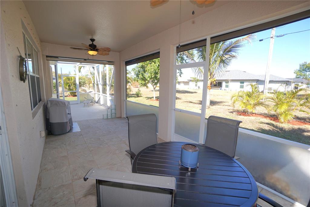 25554 Prada Drive Punta Gorda, FL 33955 - Photo 29 of 56 a living room with furniture and a large window