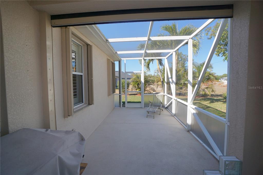 25554 Prada Drive Punta Gorda, FL 33955 - Photo 30 of 56 a view of an empty room with large windows