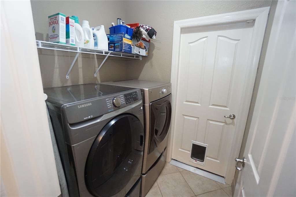 25554 Prada Drive Punta Gorda, FL 33955 - Photo 33 of 56 a utility room with dryer and washer