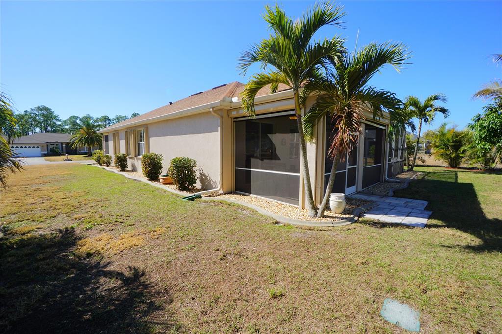 25554 Prada Drive Punta Gorda, FL 33955 - Photo 35 of 56 a view of a house with a yard