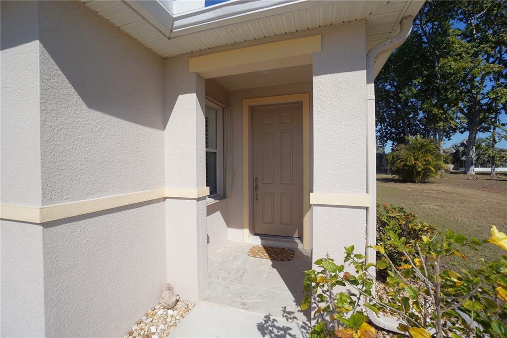 25554 Prada Drive Punta Gorda, FL 33955 - Photo 4 of 56 a view of a entryway of the house
